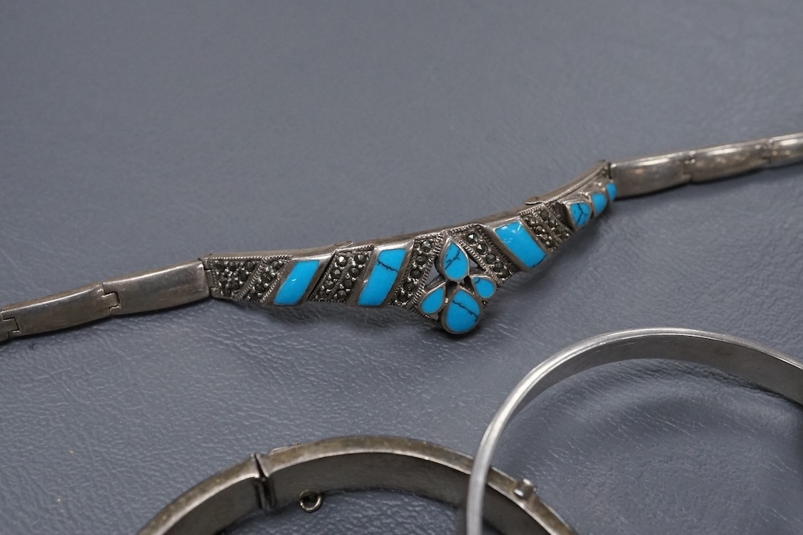 A group of assorted jewellery, including silver and white metal hinged bangles, a 1960's silver mounted cigar cutter by Ramsden & Roed, 925 necklaces and bracelet, etc.